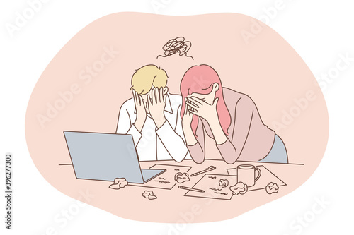 Stress, overwork, overload concept. Unhappy depressed stressed young office workers touching faces wasting time and feeling stressed and depressed with failure in office. Exhaustion, depression 