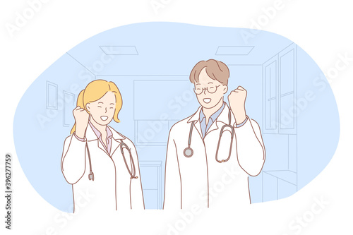 Medicine, doctors, achievement concept. Young smiling man and woman doctors in white medical uniform standing and celebrating successful achievement with hands gestures in medical clinic office