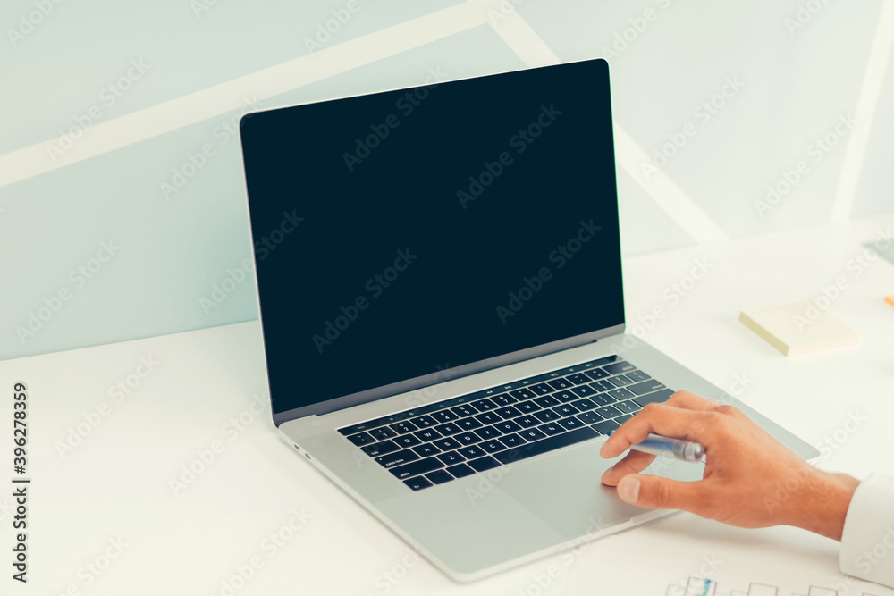 business man using laptop to analyze financial data. business man using laptop to analyze financial data.