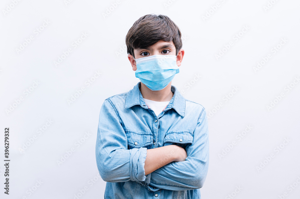 Beautiful child boy student with face mask on white background Beautiful child boy student with face mask on white background