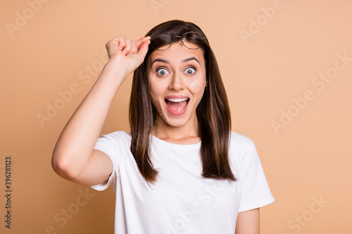 Photos Photo portrait of amazed shocked girl take off glasses opened mouth staring isol