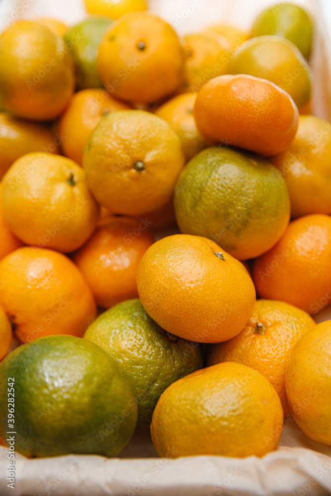 Fresh orange in the basket. Orange is a tropical fruit with sweet and sour taste. Orange is a fruit with high vitamins. Orange is beneficial to the body for health lovers. Fresh orange in the basket. Orange is a tropical fruit with sweet and sour taste. Orange is a fruit with high vitamins. Orange is beneficial to the body for health lovers.