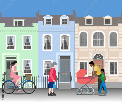 People on a city street with colorful houses. Father and son with a baby stroller, a cycling woman and an old lady. 