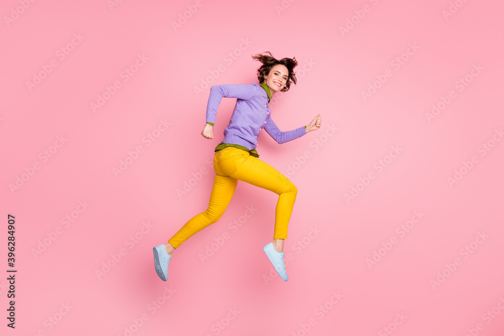 Full length profile side photo of girl jump run lucky discounts wear purple clothes isolated pastel color background