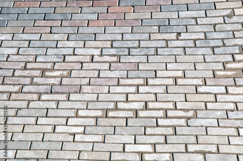 Wallpaper Mural Background, texture. Gray cobblestone pavement after rain. Torontodigital.ca