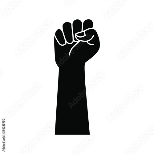 Black hand raised in a clenched fist. Freedom sign and protest symbol
