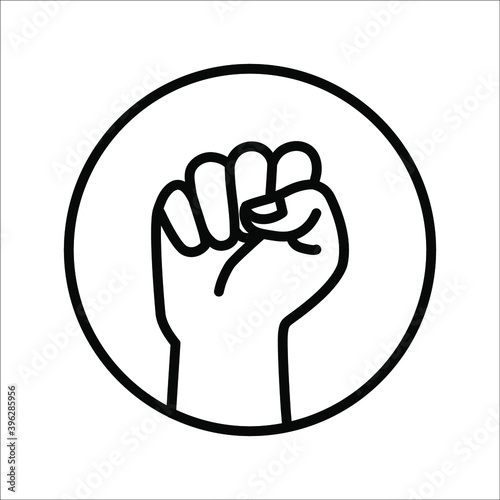 Black hand raised in a clenched fist. Freedom sign and protest symbol