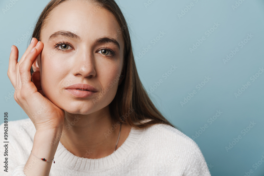 Caucasian beautiful woman posing and looking at camera Caucasian beautiful woman posing and looking at camera