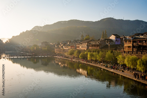 Street view local visitor and tourist at Fenghuang old town Phoenix ancient town or Fenghuang County is a county of Hunan Province  China