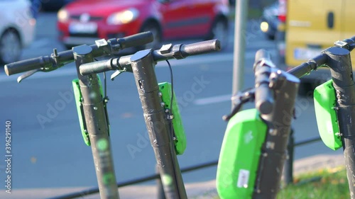 Several scooters on the street in the big city in 4k slow motion 60fps
