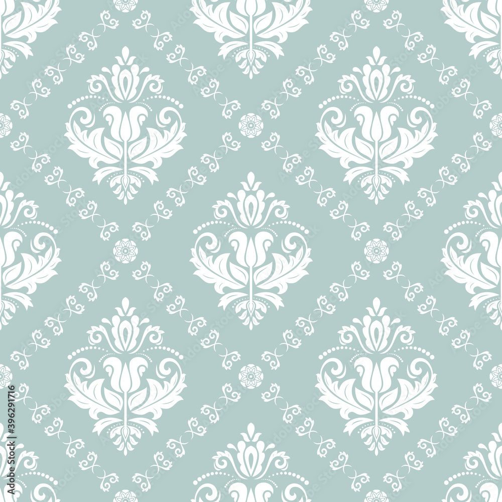 Classic seamless pattern. Damask orient light blue and white ornament. Classic vintage background. Orient ornament for fabric, wallpaper and packaging Classic seamless pattern. Damask orient light blue and white ornament. Classic vintage background. Orient ornament for fabric, wallpaper and packaging