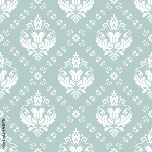 Classic seamless pattern. Damask orient light blue and white ornament. Classic vintage background. Orient ornament for fabric, wallpaper and packaging