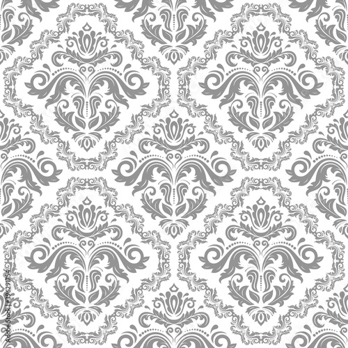 Classic seamless pattern. Damask orient light silver ornament. Classic vintage background. Orient ornament for fabric, wallpaper and packaging