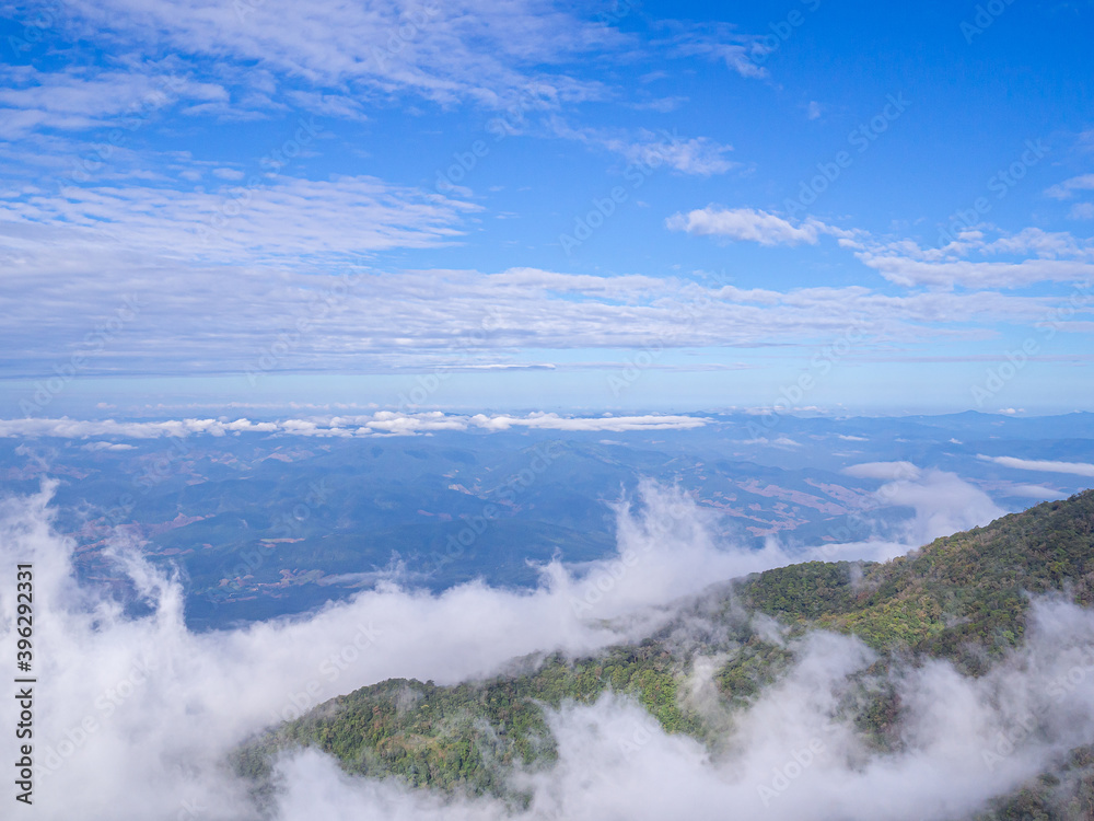 Beautiful scenic view of mountains and clouds against the sky in Kew Mae Pan nature trail at Doi Inthanon, Chiang Mai, Thailand. Famous tourist attractions of Thailand. Concept of holiday and travel