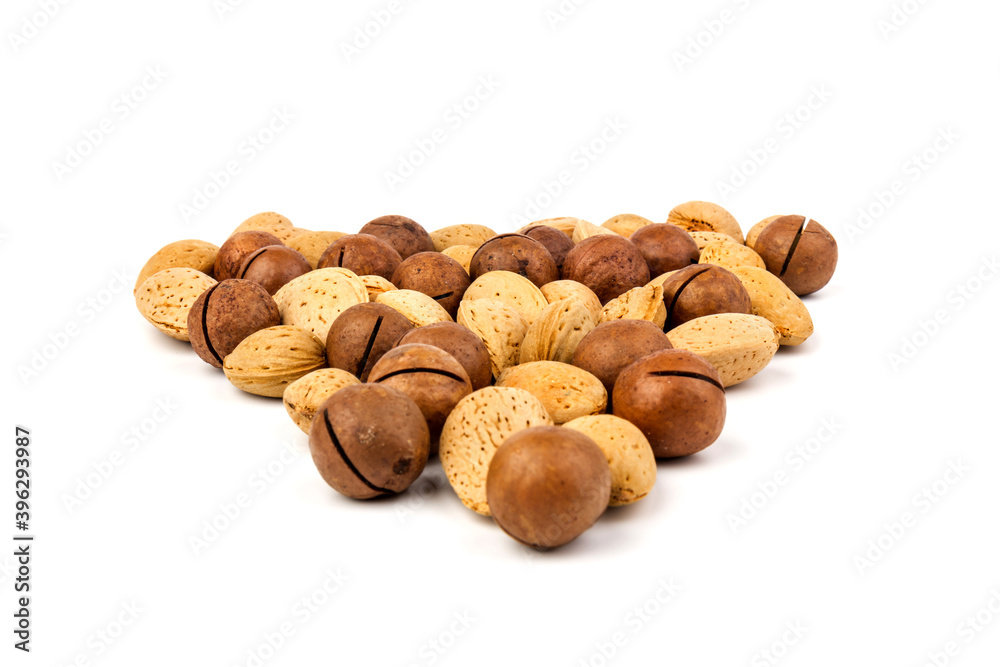 Assorted Nuts. Background of nuts - macadamia, almonds, isolated on white background Assorted Nuts. Background of nuts - macadamia, almonds, isolated on white background