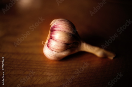 garlic on a dark wooden background