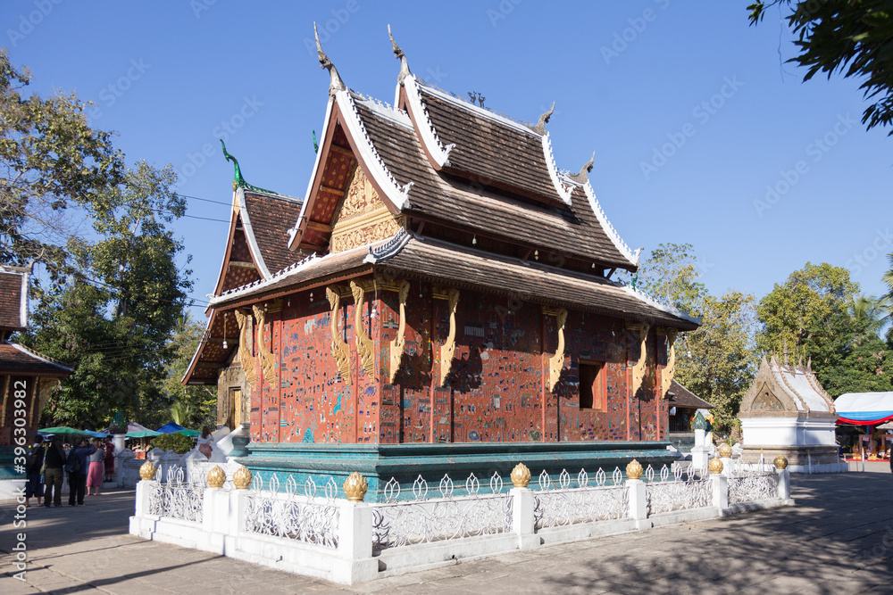 Luang Prabang Laos famous beautiful Buddhist temples set against blue sky