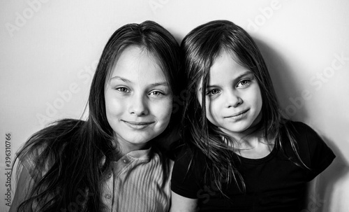 Portrait of two girls, sisters