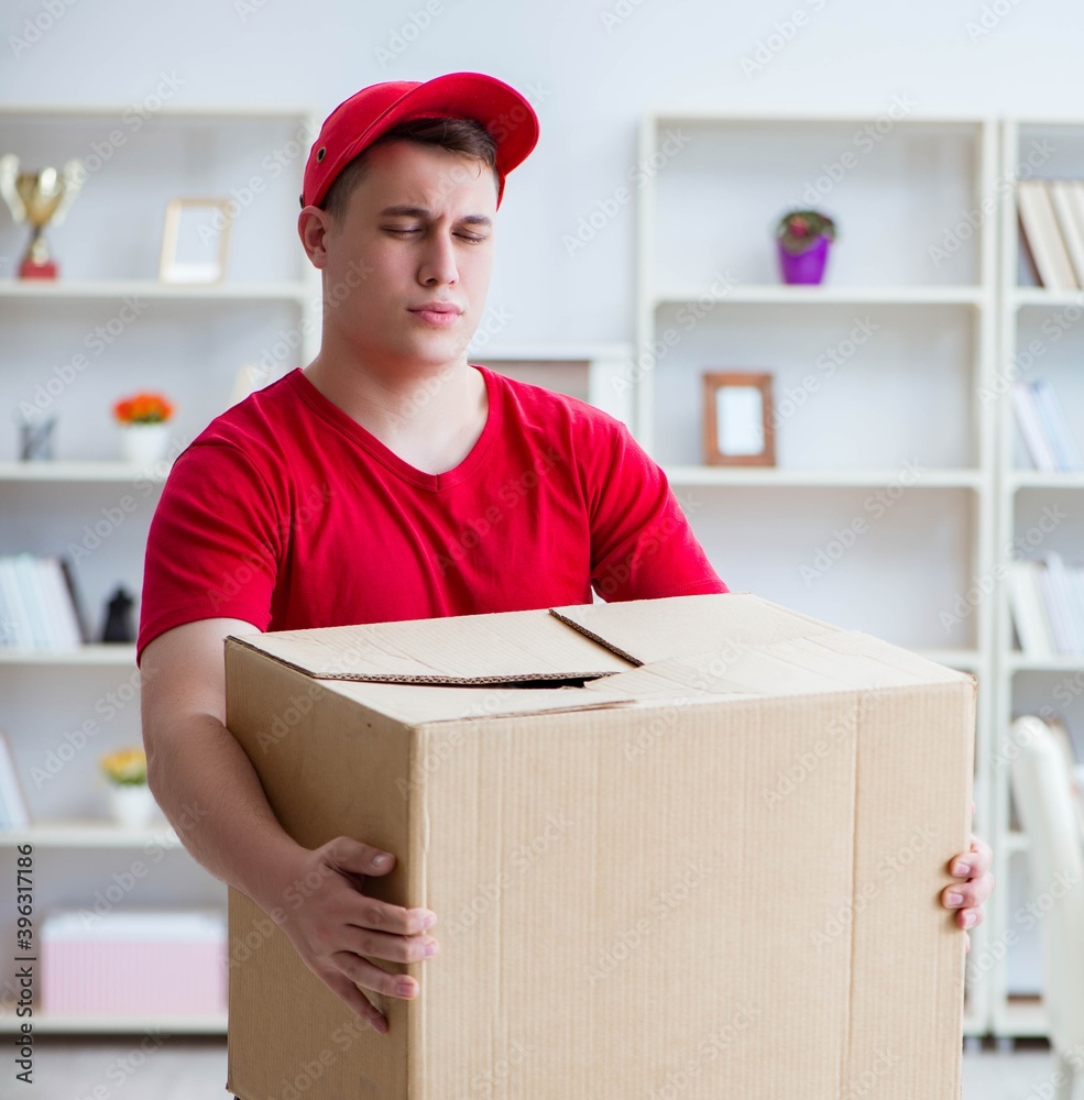 Post man delivering a parcel package Post man delivering a parcel package