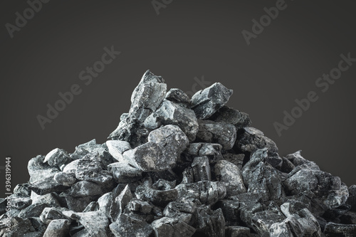 pile of wood ash against dark background. wood ash from the fireplace.
