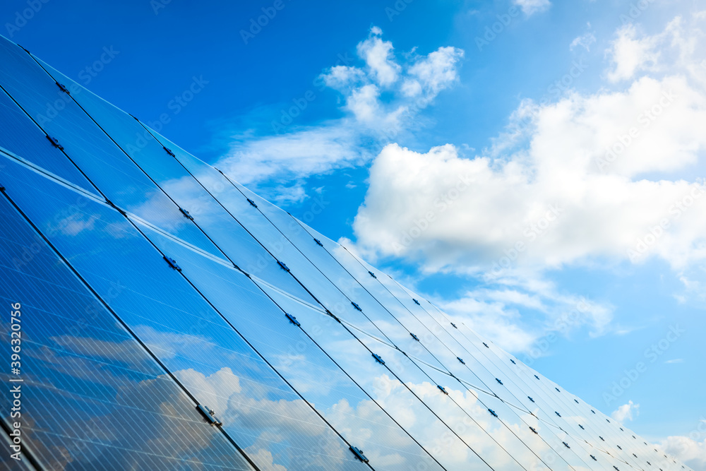 Solar power panels and natural landscape in sunny summer, Asia Solar power panels and natural landscape in sunny summer, Asia