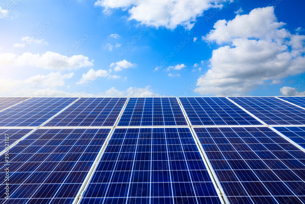 Solar power panels and natural landscape in sunny summer, Asia Solar power panels and natural landscape in sunny summer, Asia