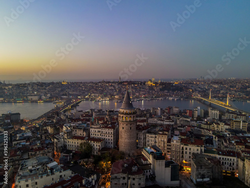 Aerial Galata Tower at Sunset.  Galata Bridge and Golden Horn of Istanbul with beautiful colors at Sunset.  © Metin