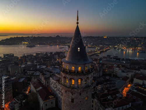 Aerial Galata Tower at Sunset.  Galata Bridge and Golden Horn of Istanbul with beautiful colors at Sunset. 