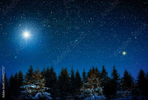 Christmas star on night abstract sky. Abstract Background. © Swetlana Wall