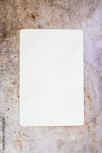 Blank piece of paper on metal surface  © Viktor Pravdica