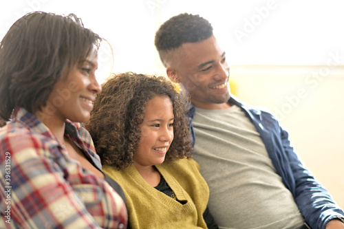 Portrait of happy african-american family of three