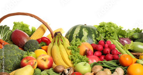 Assortment of fresh organic fruits and vegetables on white background