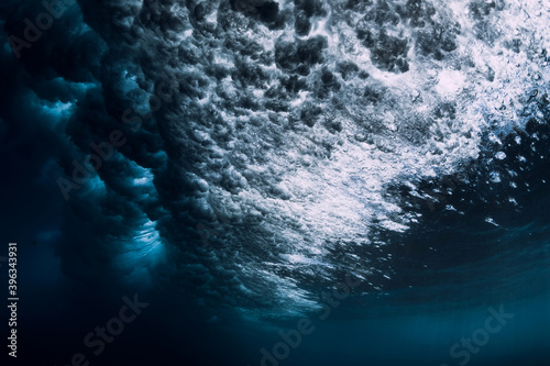 Underwater ocean wave with foam and bubbles