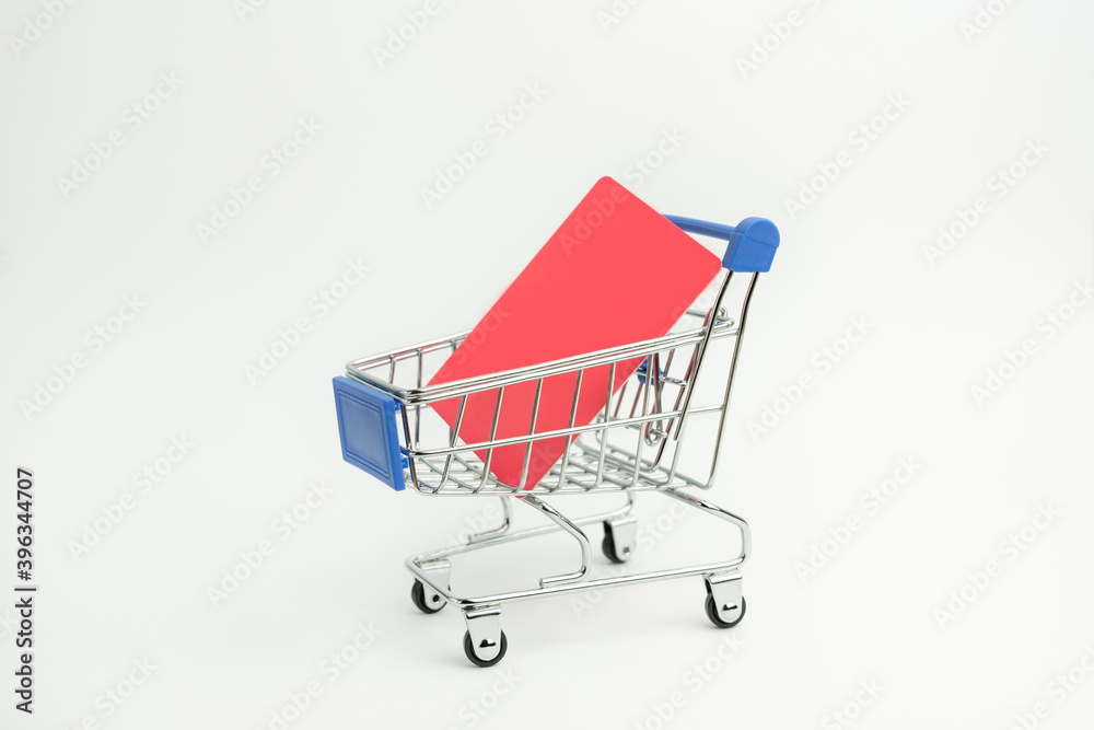 Shopping cart with smartphone blank screen copy space.Black screen mockup banner template.Online shopping , e-commerce, e-shopping lifestyle concept
