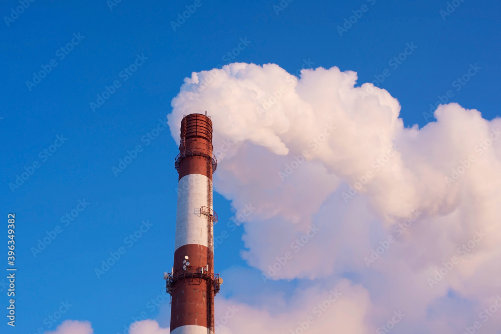 Winter city landscape. Steam from the pipes to heat the building. Winter city landscape. Steam from the pipes to heat the building.