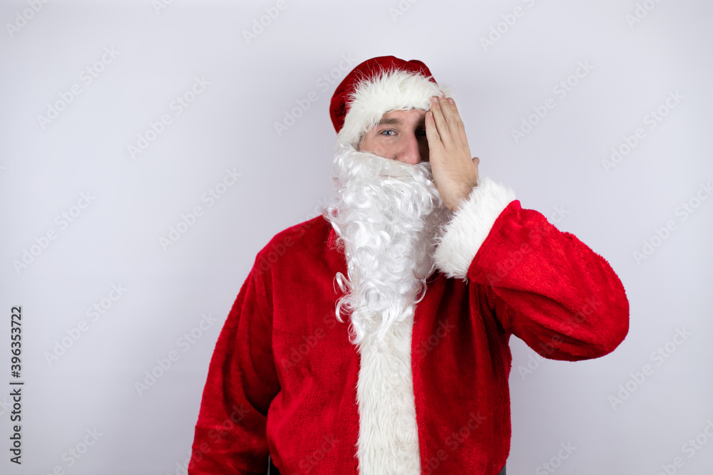 covering one eye with hand, confident smile on face and surprise emotion. covering one eye with hand, confident smile on face and surprise emotion.
