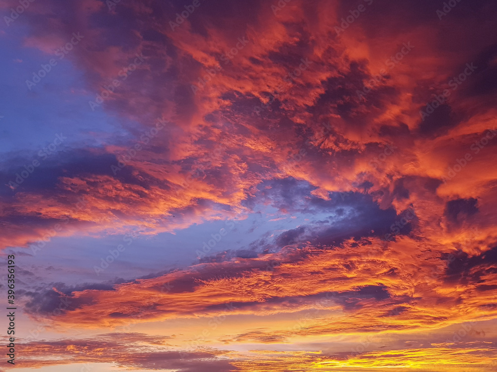 Soft, fluffy and colorful cloud. Sunset sky