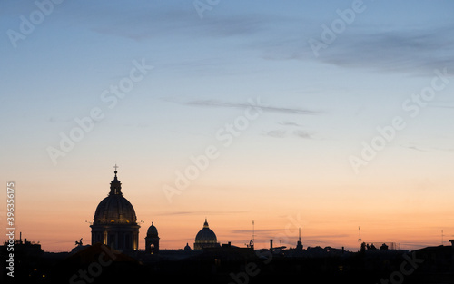 Sunset in Rome. Beautiful blue and pink sky with the silhouette of the cathedral