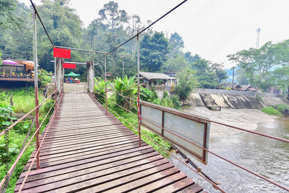 Fototapeta premium Wooden Suspension Bridge at Kiriwong Village
