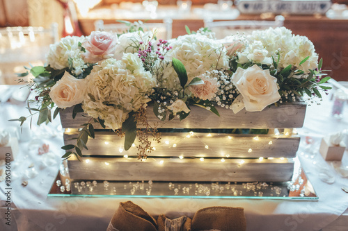 flower centrepiece on dinner table