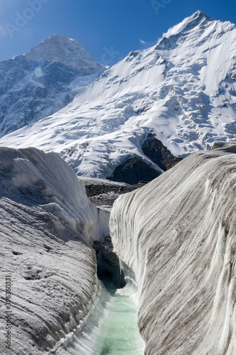 River on North Engilchek Glacier and view of Khan Tengri peak (7010 m), Central Tian Shan, Kazakhstan - Kyrgyzstan. photo