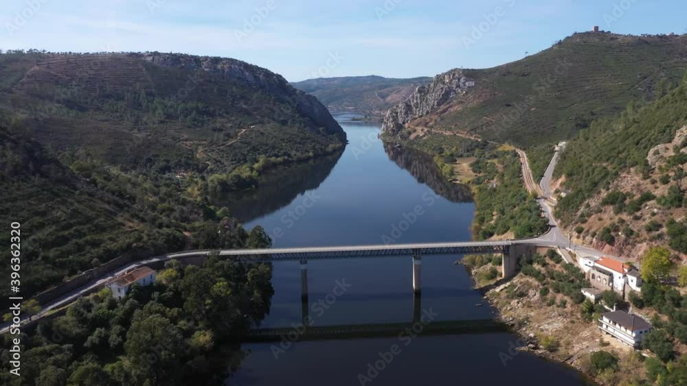 Aerial drone shot towards to a bridge on a lake Aerial drone shot towards to a bridge on a lake