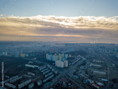 Aerial drone flight over Kiev, haze over the city. Autumn morning. © Sergey