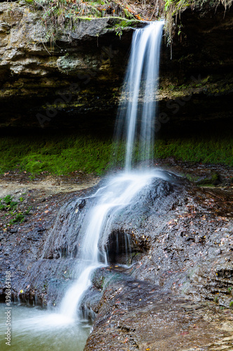 Beautiful small waterfall in Europe  Moldova. Landscape with river. Clean water in nature.