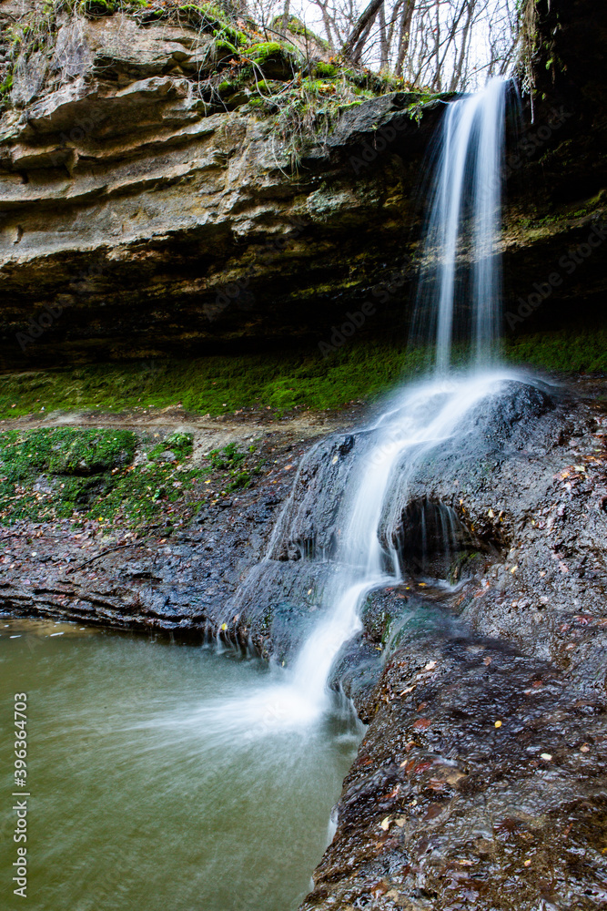 Fototapeta premium Beautiful small waterfall in Europe, Moldova. Landscape with river. Clean water in nature.