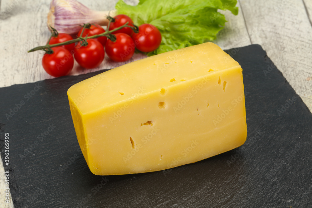Hard yellow tasty cheese brick Hard yellow tasty cheese brick