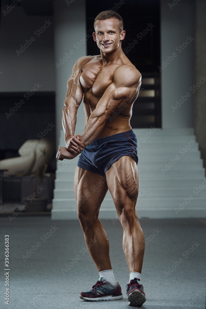Caucasian man pumping up muscles. fitness training Caucasian man pumping up muscles. fitness training