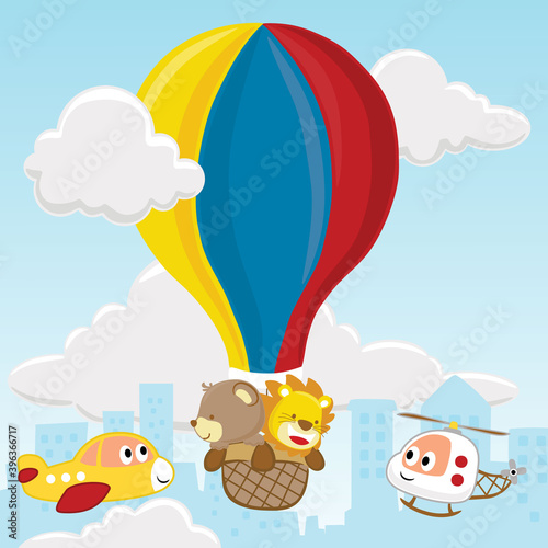 Cartoon of bear and lion on hot air balloon with funny air transportations
