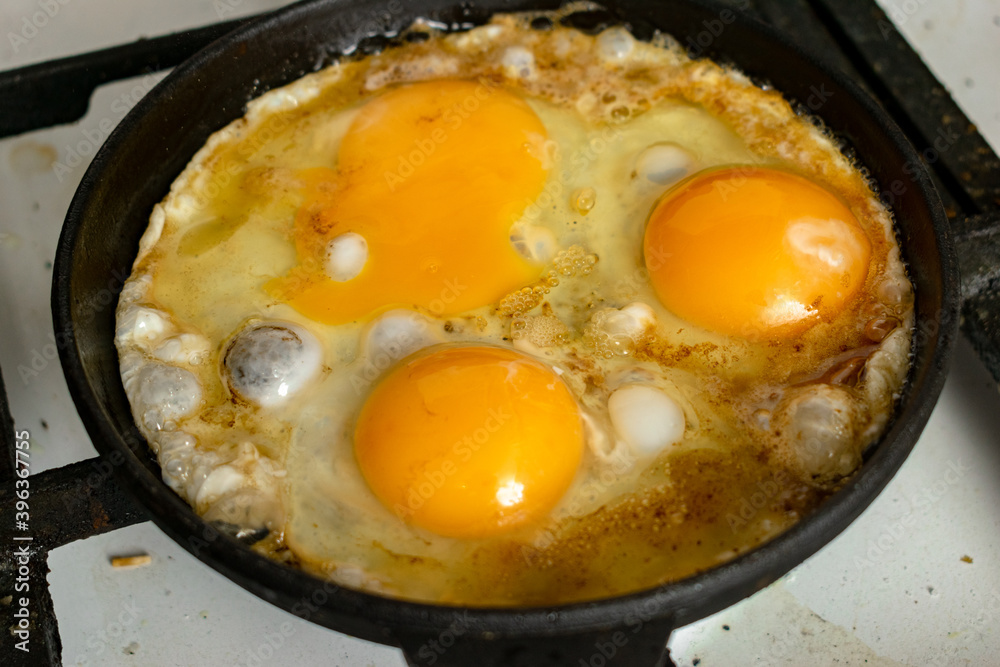casually cooked scrambled eggs in a skillet casually cooked scrambled eggs in a skillet