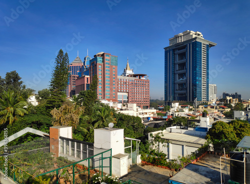 A sunlit view of downtown Bangalore, India on a clear sunny day photo
